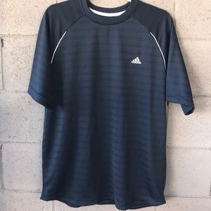 Men’s Adidas shirt with embroidered Adidas sign.